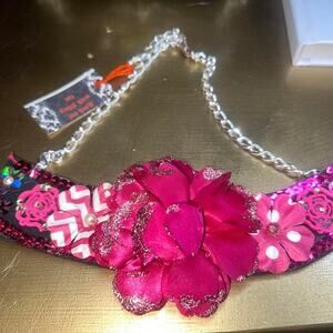 Statement necklace.  Magenta flower and sequin glitter.